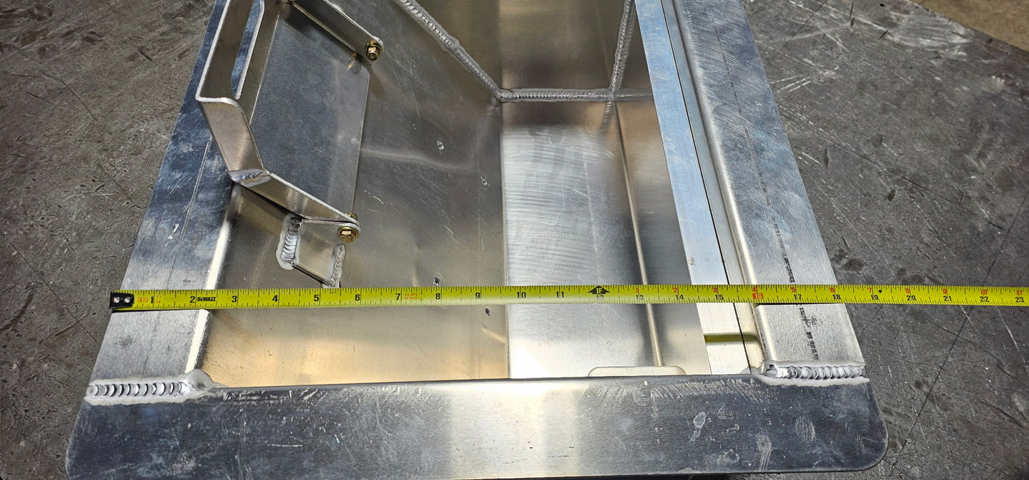 Aluminum winch box with a tape measure indicating that the overall length of the outside of the box is 18"  long.