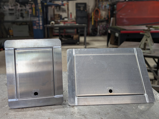 In-floor Battery compartment box sitting to the left of an In-floor winch box